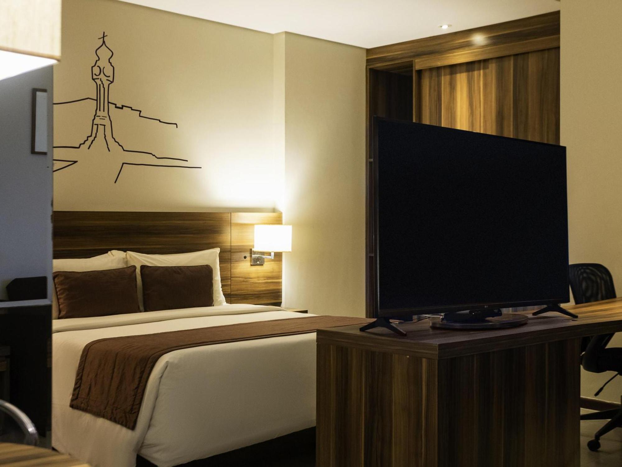 Quarto Queen Superior com Sofá-Cama
